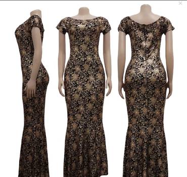 "فستان حورية البحر كاميليا الذهبي" (The Golden Camellia Mermaid Gown)